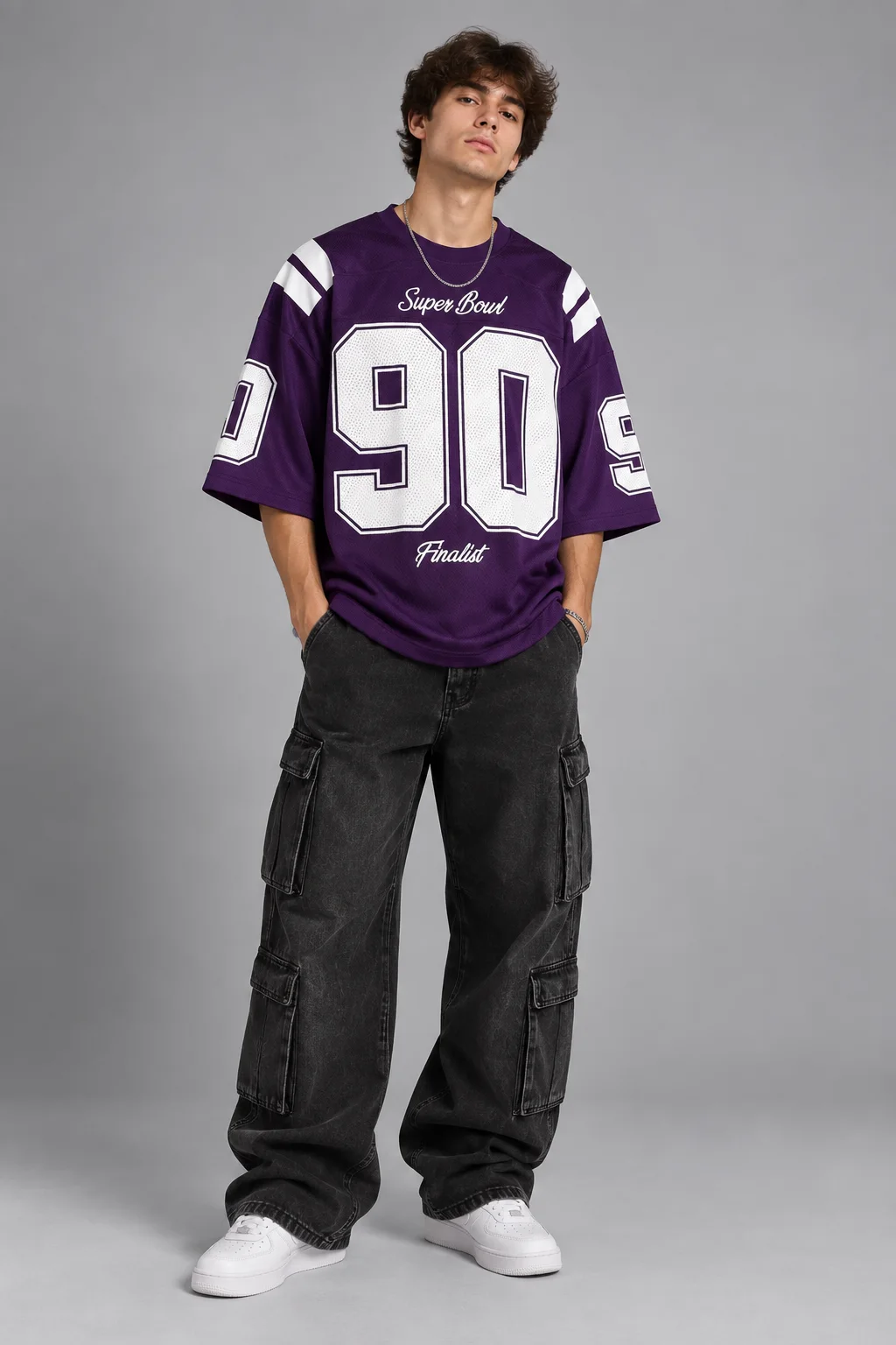 Model wearing a purple oversized varsity football jersey