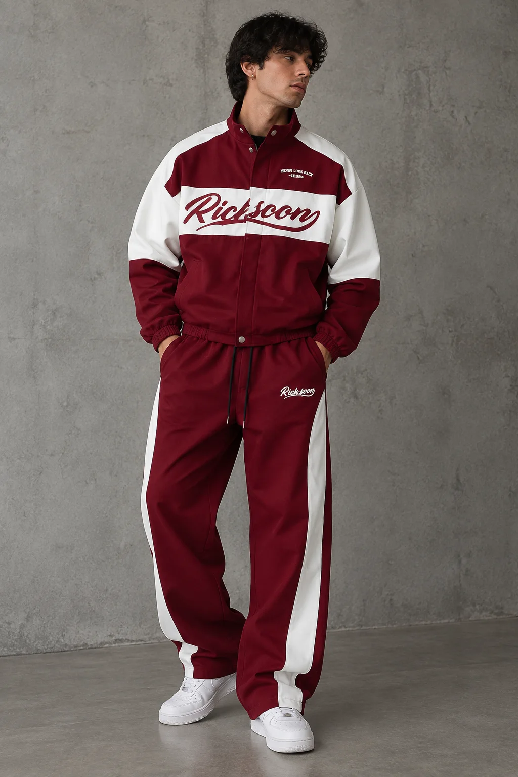 Model wearing a burgundy and white vintage color-block tracksuit set